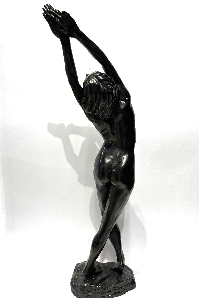 Charlotte Marlow - The Dancer Sculpture showing girl reaching upwards with both hands