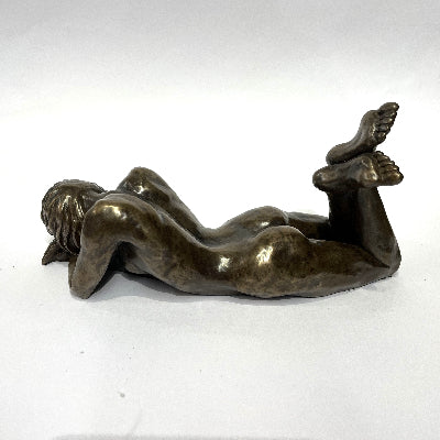 
Charlotte Marlow - Emma Sculpture showing girl lying on front with head in hands