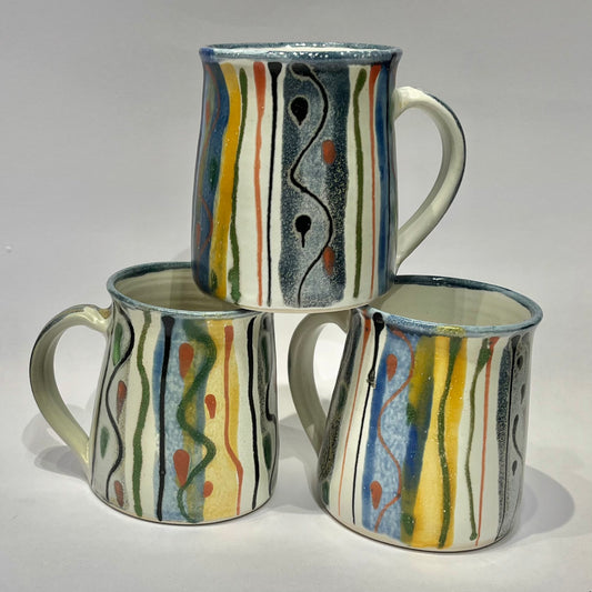 ceramic mugs with abstract hand-painted design made by lea Phillips