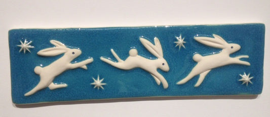 Three Hares in a row (1)